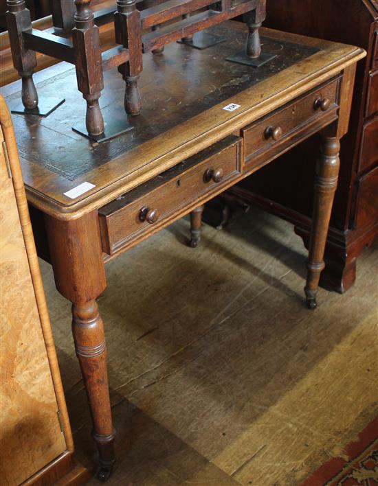 Mid Victorian mahogany two drawer writing table